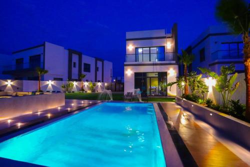 The Wave Villa 5 BR - Al Dana Island Fujairah - About Your Stay
