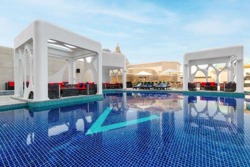V Hotel Dubai, Curio Collection by Hilton - About Your Stay