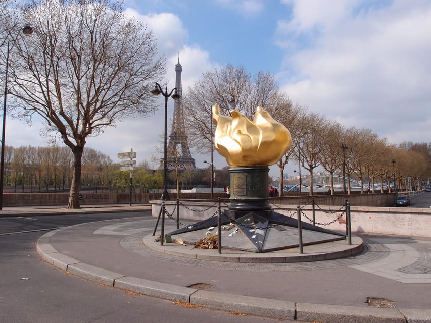 Eiffel Tower History/Curiosities Tour Plus Boat Ride on the Seine River