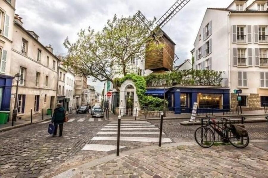 Montmartre Guided Tour With Sacré CœUr Church & City Views - Exploring Montmartres Artistic Heritage