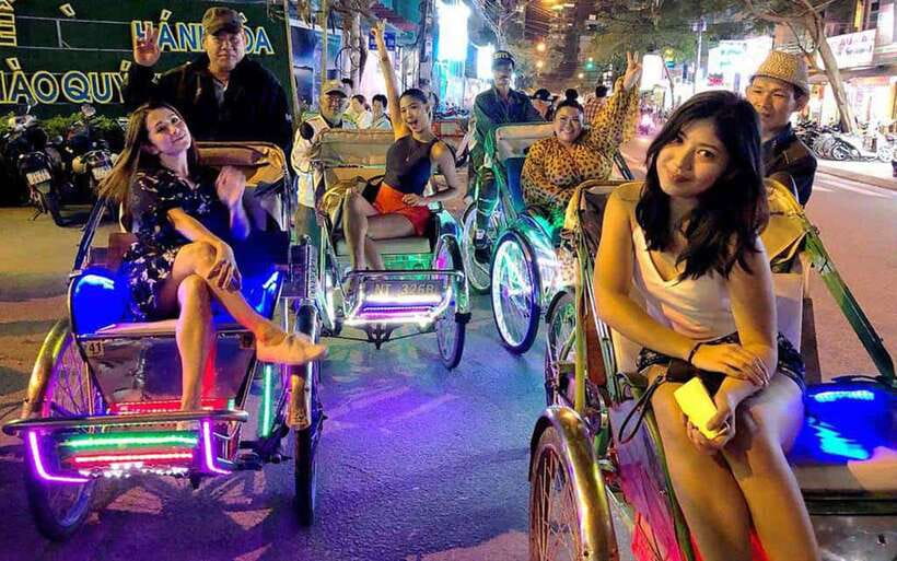 Hue Evening Foodie Cyclo Tour & Folk Music on Perfume River