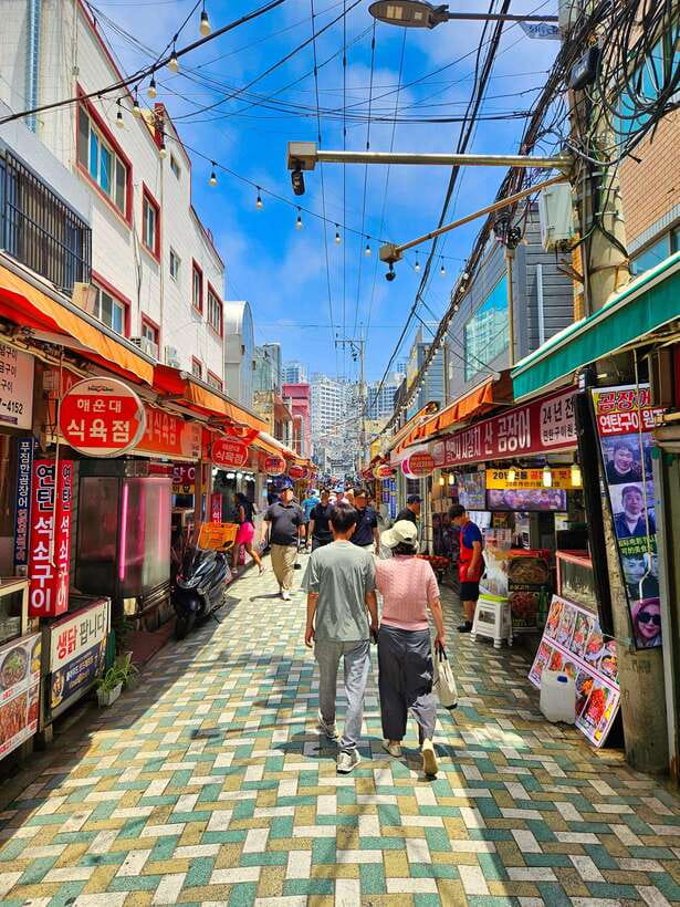 Busan: Haeundae 100-Minute Walking Tour - Dongbaek Island: Coastal Views and Cultural Legacy