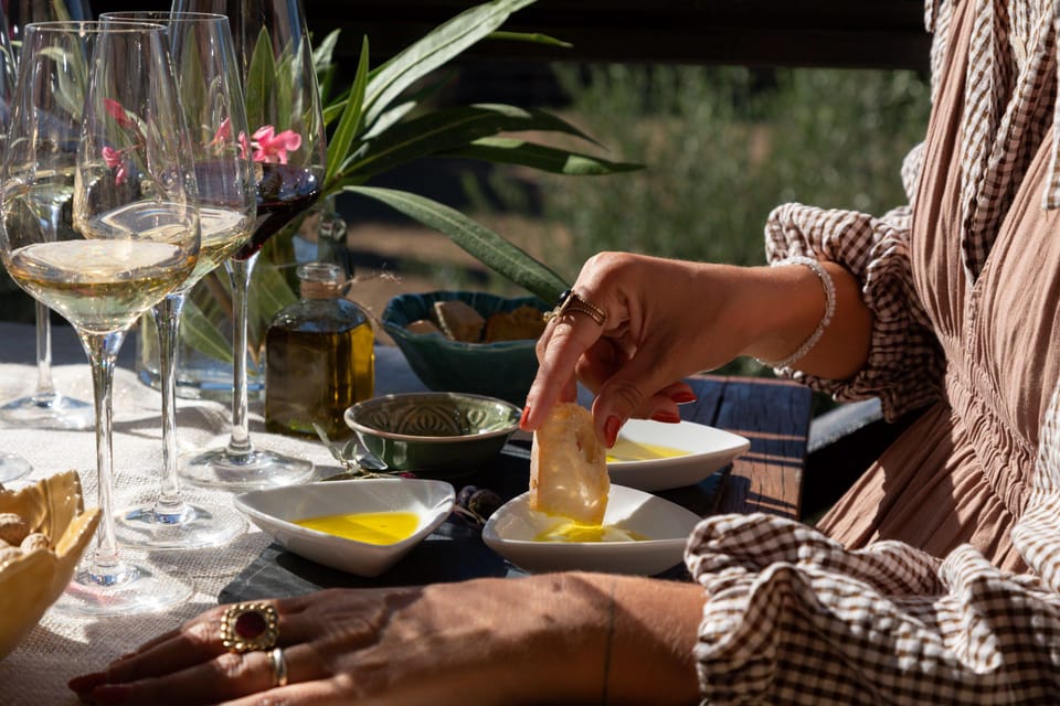 Discover Portugal's Flavors: Wine & Olive Oil Tasting - A Well-Curated Tasting Experience