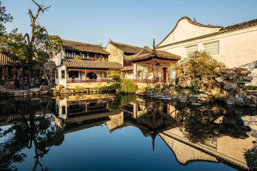 From Shanghai: Suzhou and ZhouZhuang Water Village Day Tour - Discovering the Master-of-Nets Garden