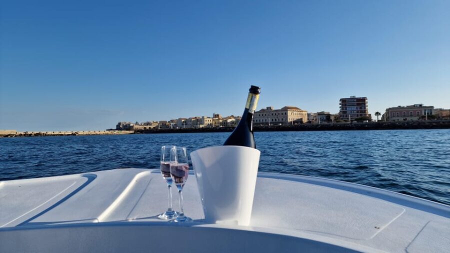 Siracusa: Ortigia & Sea Caves Boat Tour With Sunset Apertif - Pricing and Booking Details