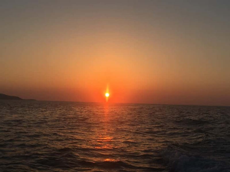 Agia Pelagia: Sunset Motorboat Tour with Soft Drinks - The Itinerary in Detail