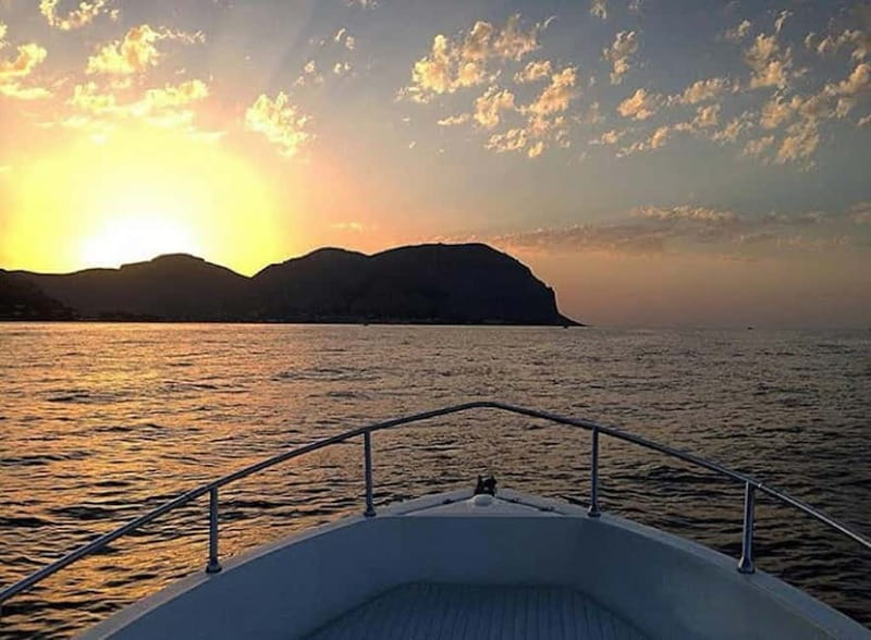 Aperitif on a boat at sunset at the Queen Cave - What’s Included and Practical Considerations
