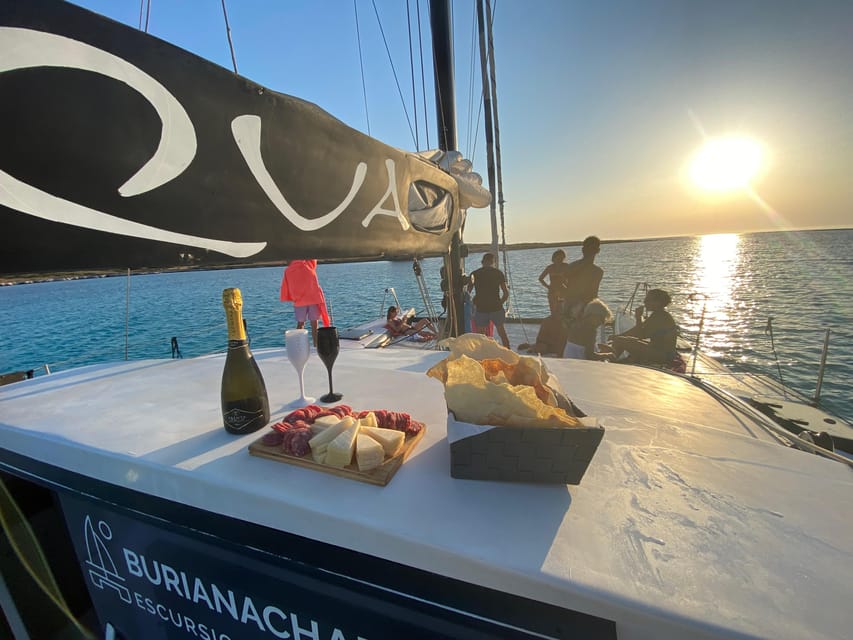 aperitifs at sunset on the Stintino catamaran burianaCharter - Food, Drink, and Atmosphere