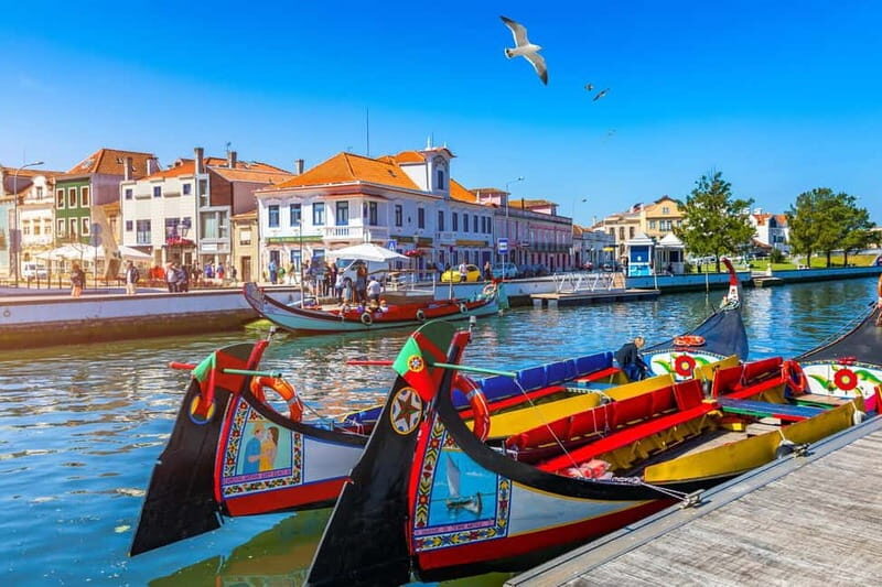 From Coimbra: Tour to Aveiro, Costa Nova beach, and Moliceiro boat ride - Visiting Praia da Barra: The Long, Wave-Free Beach