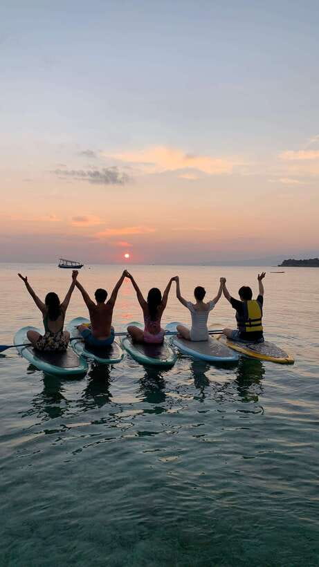 gili sunrise Stand-up paddle boarding or kayaking (droneshot - The Watercraft: Paddleboards and Kayaks  