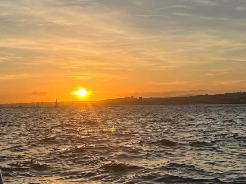 Lisbon: Sunset Boat Tour with Postcard Scenery - Key Points  