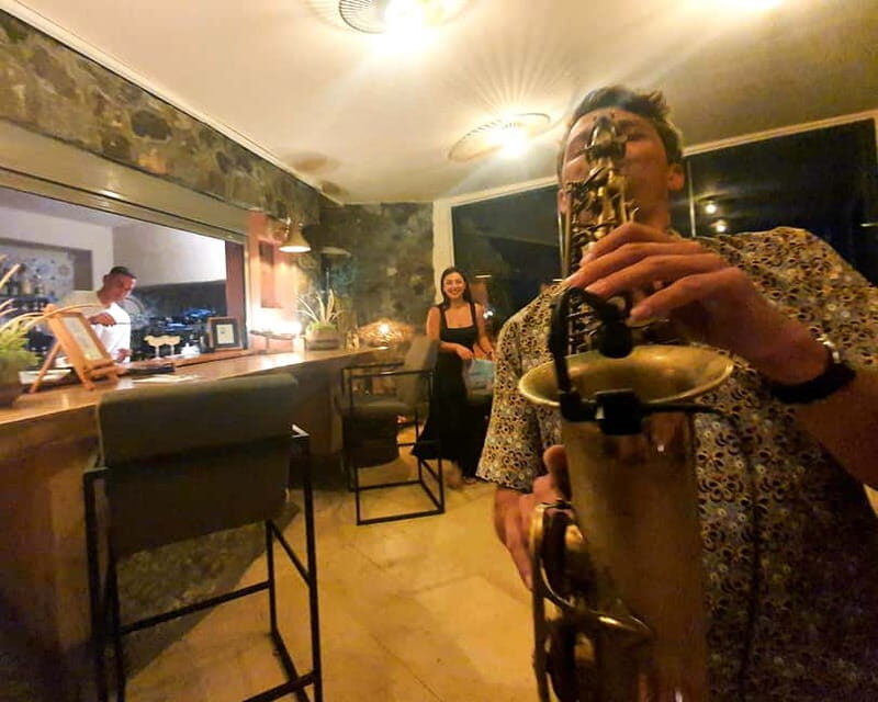 Live Music Dinner with Sunset and Caldera Views - Who Should Consider This Experience?