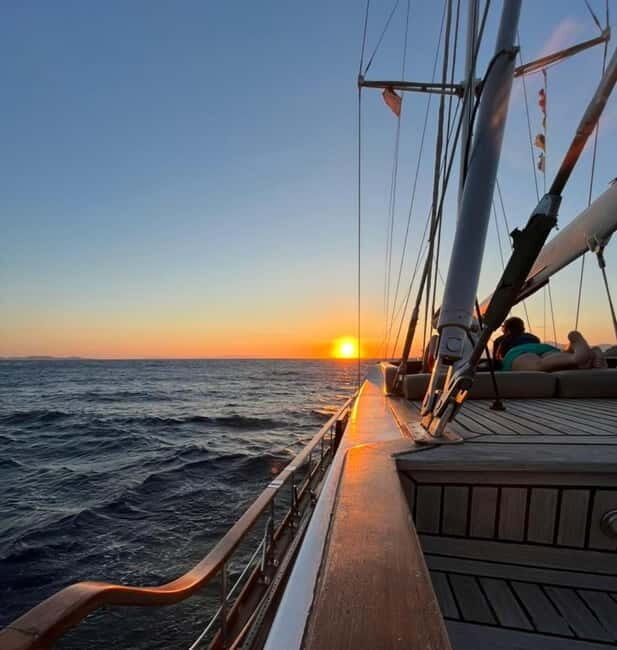 Mykonos: Sunset Sail Cruise to Rhenia with Beach and Dinner - The Cruise Experience: A Closer Look