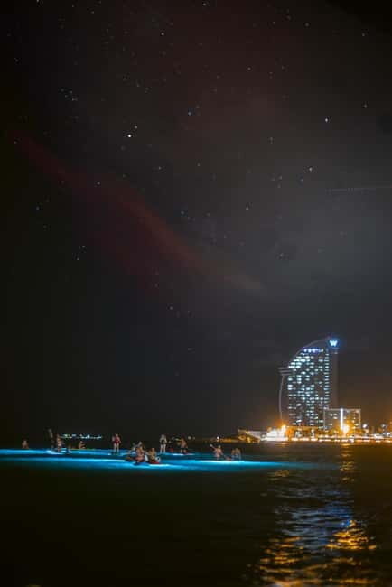 Paddle surf at night with light & drink -photos &videos - What to Expect from the Night Paddle Surf Experience