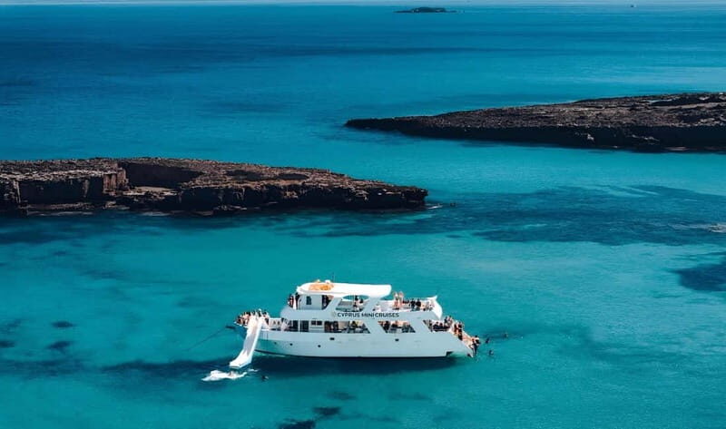 Paphos: Blue Lagoon Sunset Cruise, BBQ & Wine + Water Slide - What Makes This Tour Special