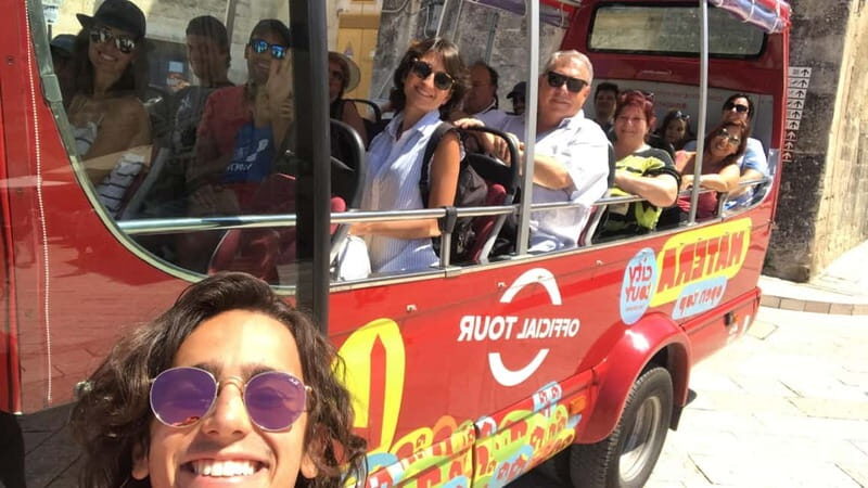 Sassi of Matera eco-bus open-top tour vehicle in the upper town