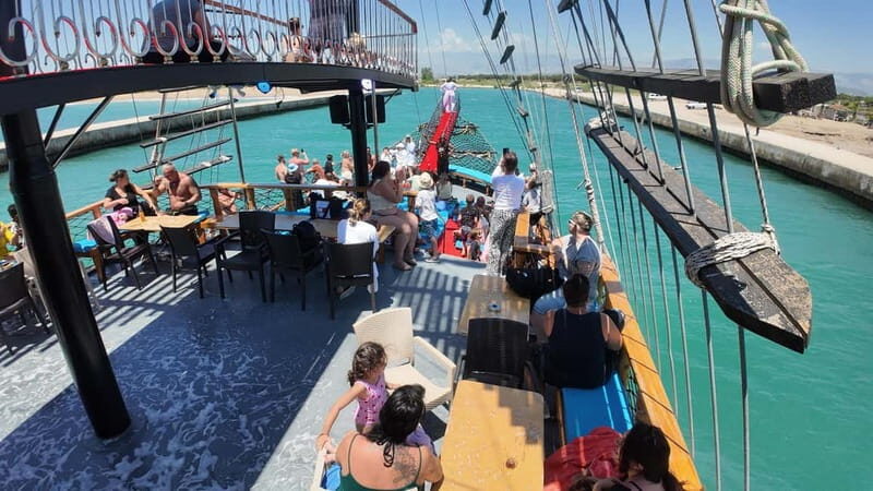 Side: Dolphin Boat Tour With Lunch Foam party Swimming - A Delicious Lunch with a View
