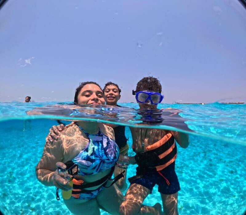 Cancún Private Catamaran with Snorkel and Open Bar - Relaxing on the Beach