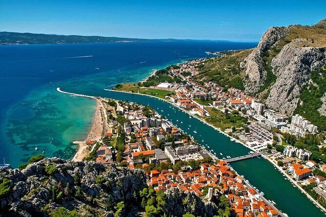 From Split Omis Day Tour with Boat Cruise and Swimming - The Boat Cruise: A Scenic Highlight