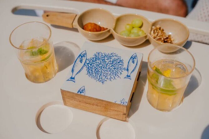 Guided boat tour with wine and sunset option. - Practical Details and Booking Considerations