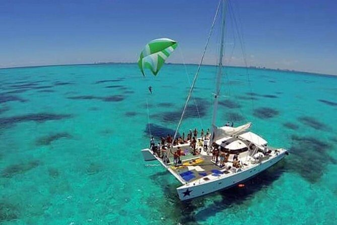 Isla Mujeres, Catamaran tour in one day for one price - Relaxing at the Beach Club: Food, Drinks, and Fun