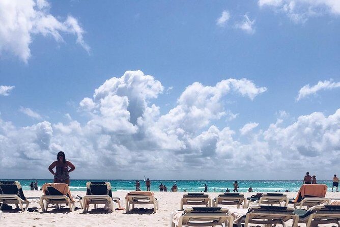 Live this unique experience. Catamaran to Isla Mujeres Tour. Open Bar included. - Authentic Experiences and Notable Highlights