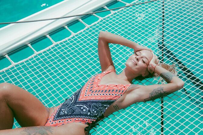 Luxury Catamaran Privilege to Isla Mujeres + Open Bar VIP - The Beach Club: A Relaxing Break with Delicious Food