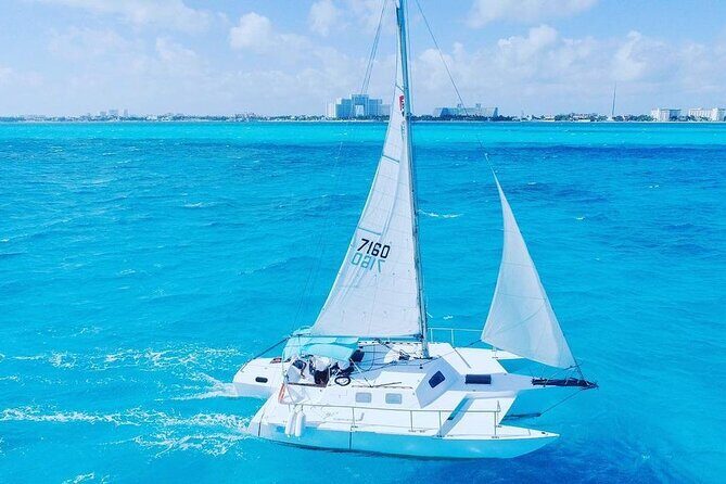 Luxury Catamaran to Isla Mujeres, Snorkeling, Buffet and Ice Bar - Authentic Experiences and Visitor Feedback