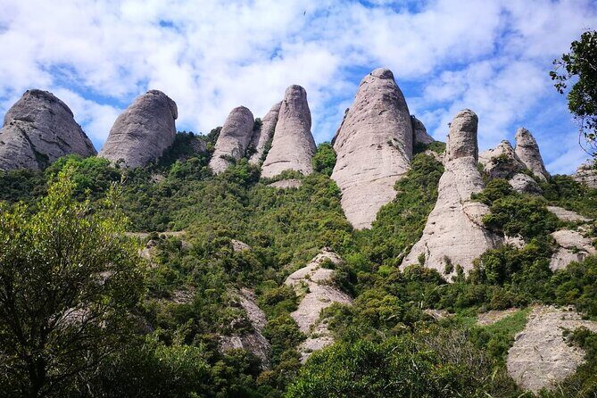Montserrat Day Trip with Lunch and Wine Tasting from Barcelona - Transportation and Group Size