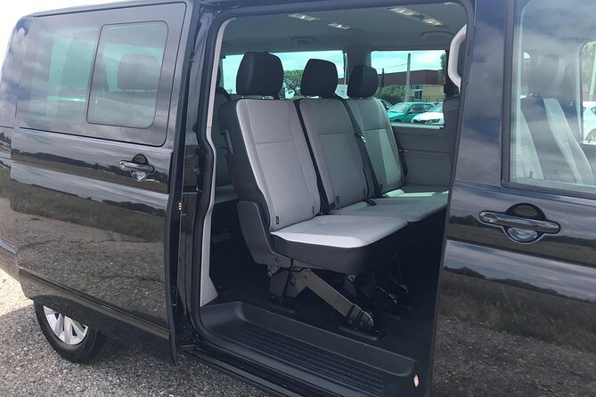 One-way transfer by minivan from Seville Airport to hotel in Seville Center - Meeting Points and Logistics