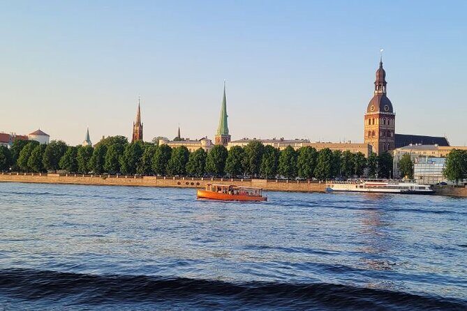 Riga Canal and Daugava Boat Tour with Welcome Drink & Audio Guide - What to Expect on the Itinerary