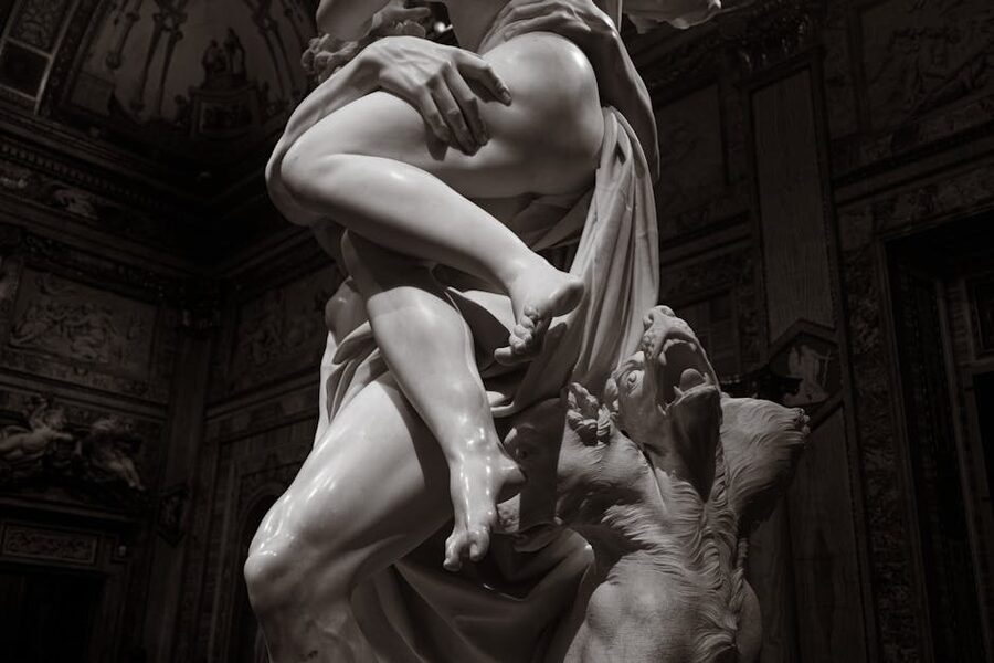 Dramatic baroque marble sculpture inside Borghese Gallery