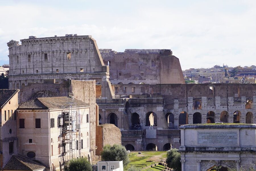 The iconic Colosseum exterior showing its layered arched facade