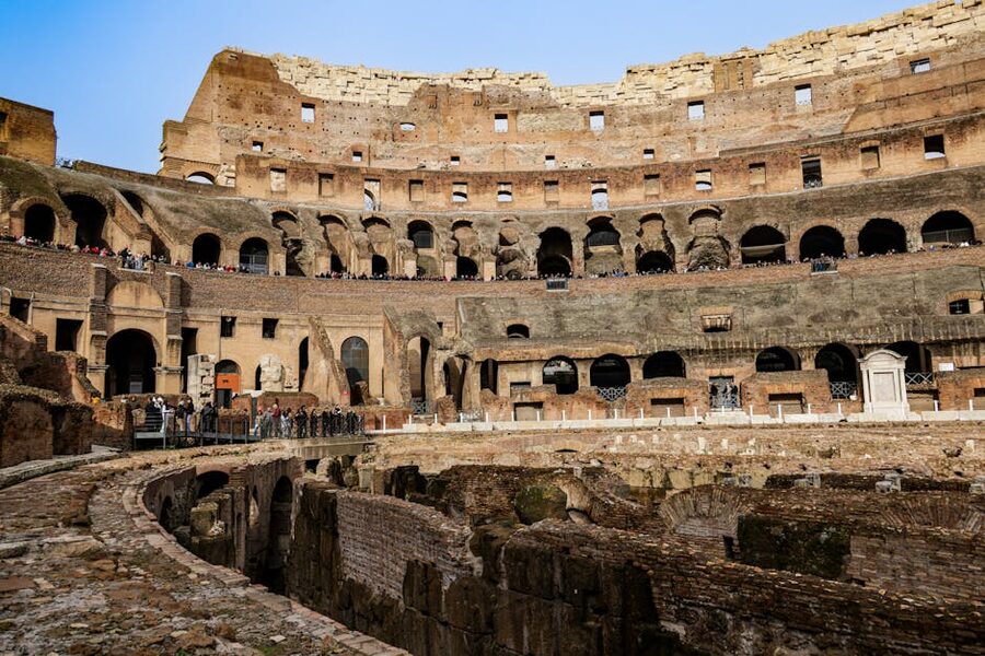 Interior view of the Colosseum showing ancient arches and the arena floor