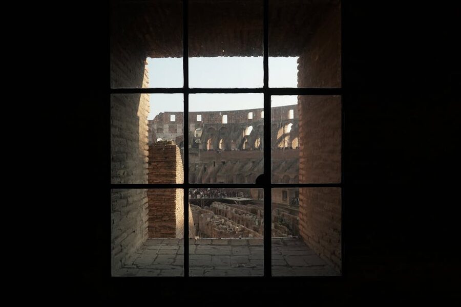 View through a Colosseum window looking down at the arena and underground