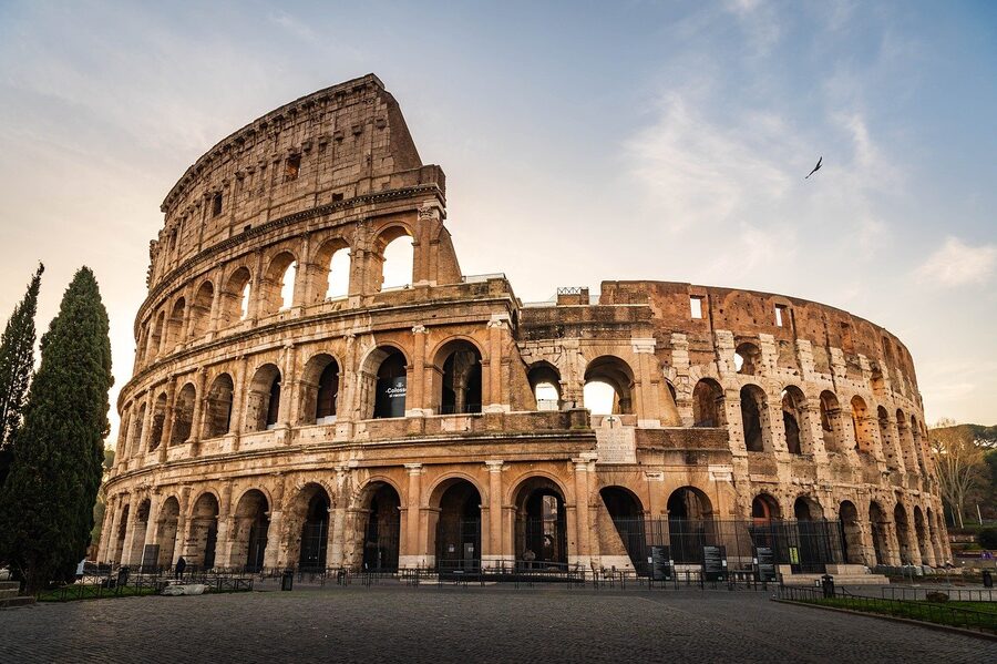 The Colosseum bathed in warm sunset light in Rome