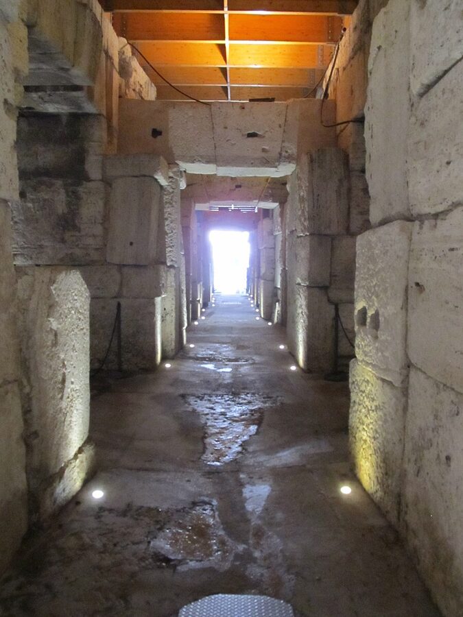Stone tunnel passageway in the underground hypogeum beneath the Colosseum