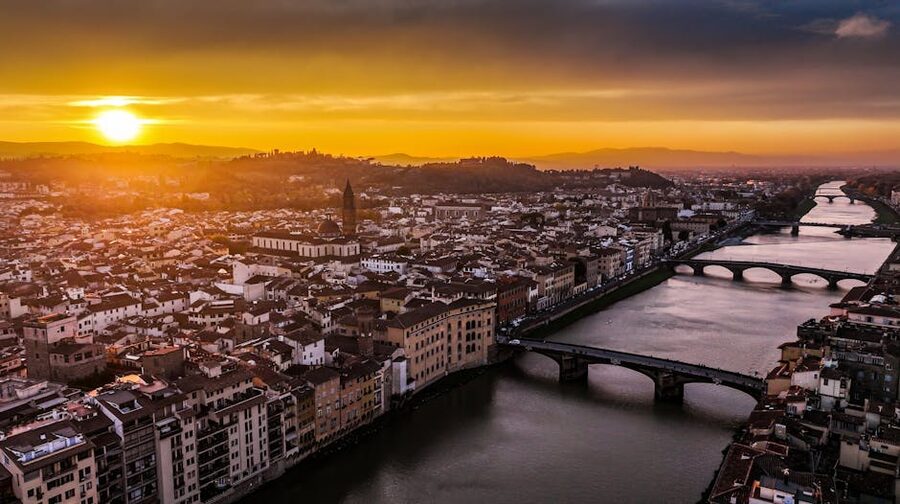 Aerial view of Florence at sunset with the Arno river