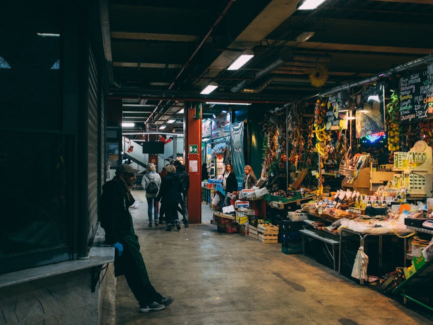 Busy indoor food market scene in Florence