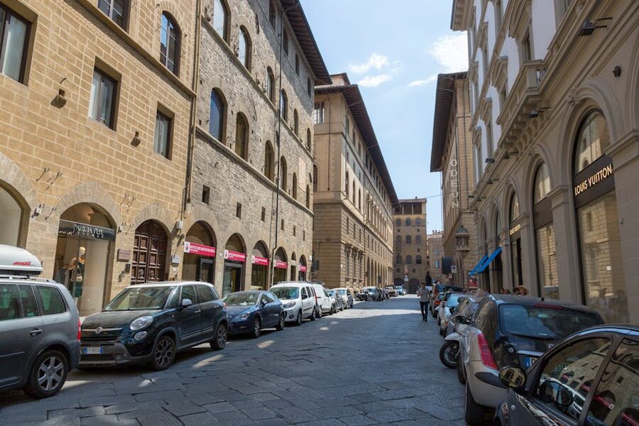 Florence street with boutiques and classic architecture