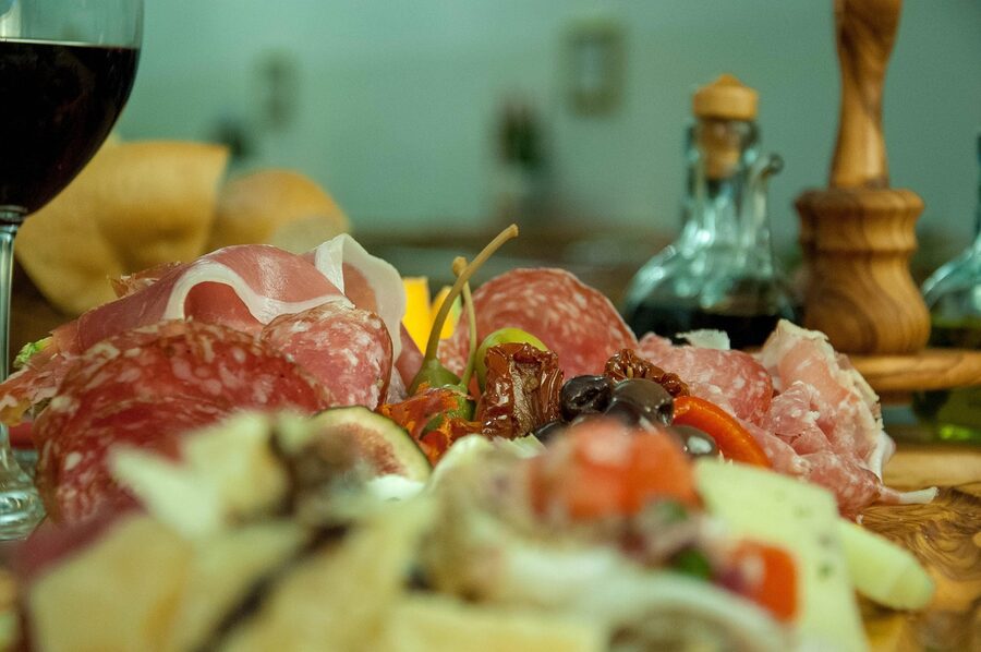 Italian antipasti with cheese salami and red wine