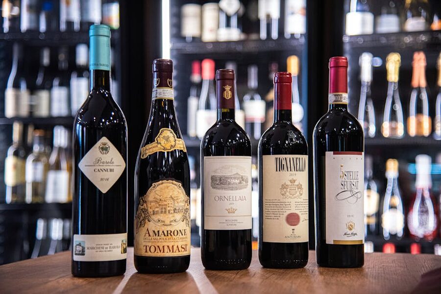 Italian red wines on display in a wine store