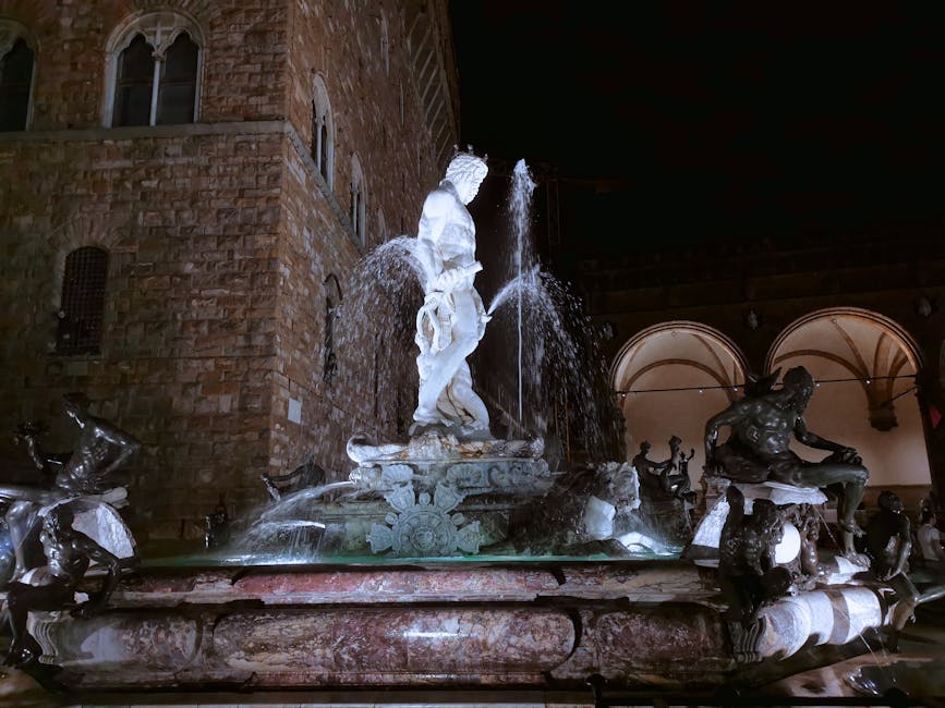 Piazza della Signoria with the Neptune Fountain illuminated at night