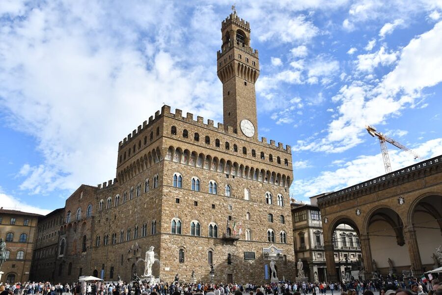 The Piazza della Signoria with crowds in front of Palazzo Vecchio