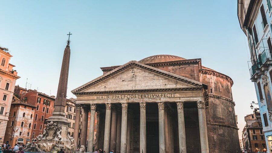 The Pantheon exterior on a sunny day in Rome with visitors