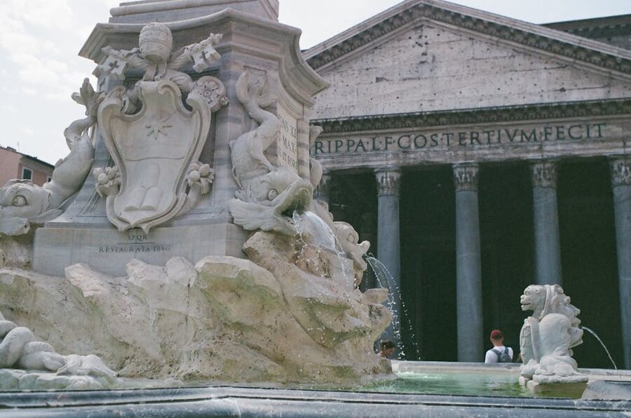 Elegant fountain with the Pantheon visible in the background