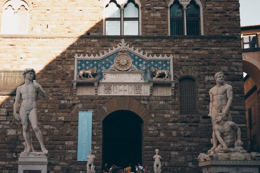 The David replica standing in Piazza della Signoria in front of Palazzo Vecchio