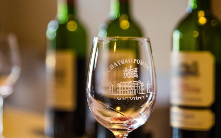 Red wine bottle and glass for tasting