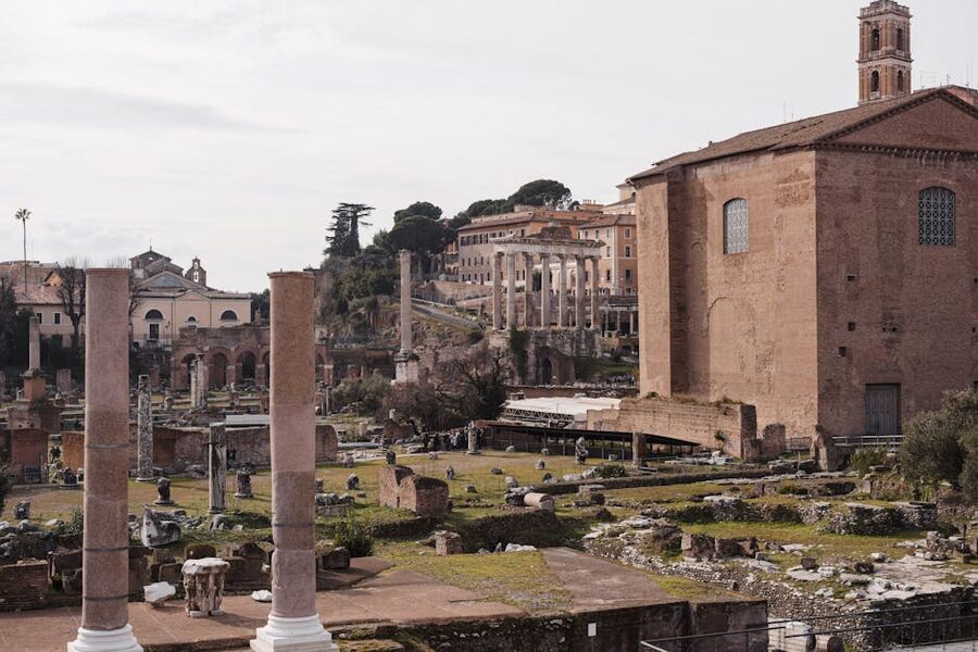 Ancient Roman colonnade with columns and grass