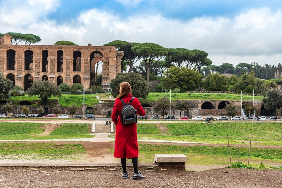 Visitor viewing the Circus Maximus ruins in Rome